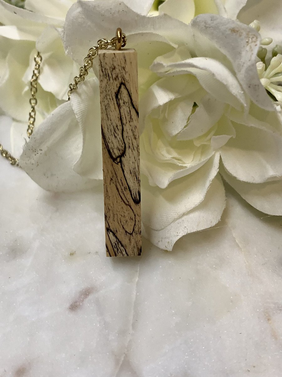 Go visit our shop on Etsy! McEvoymade! See what other pieces you want to add to your cart for when we drop the necklaces! Here’s a look at one of our slim Spalted Tamarind necklaces. #spaltedtamarind #woodjewelry #necklaces