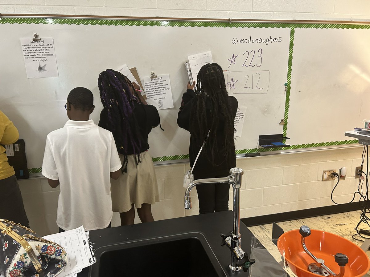 Stations in middle school? Yes please!! Students are working in pairs to solve word problems by adding and subtracting integers. #BuildingThinkingClassrooms
#McDonoughMiddle
#7thGradeMath
