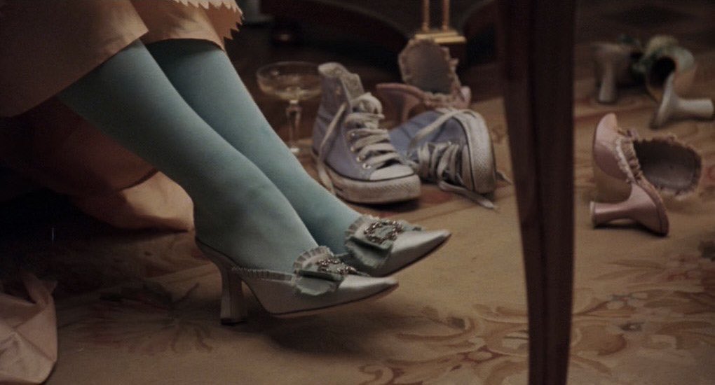 a pair of converse in a shot of marie antoinette (2006)