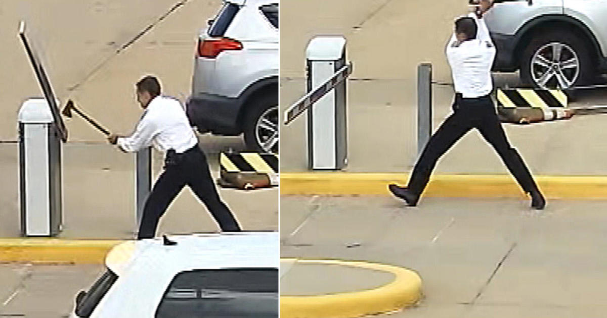 CBSNewsColorado's tweet photo. United Airlines pilot charged in bizarre ax attack caught on video in Denver International Airport lot https://t.co/92AFMhm5Lx https://t.co/xYplMoj5qd