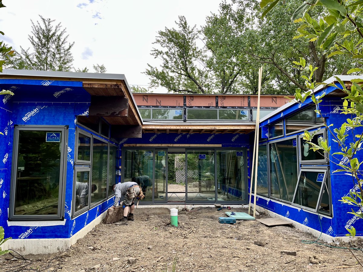 TBDArchitects's tweet photo. Update from our Midcentury for the Next Century project: new air barrier (@TheHenryCompany), wood fiberboard insulation (Steico), and @AlpenHPP triple-glazed windows..This will be a new, sleeker, smarter, sophisticated (and dry) animal with the same skeleton! https://t.co/L6GeTm8khf