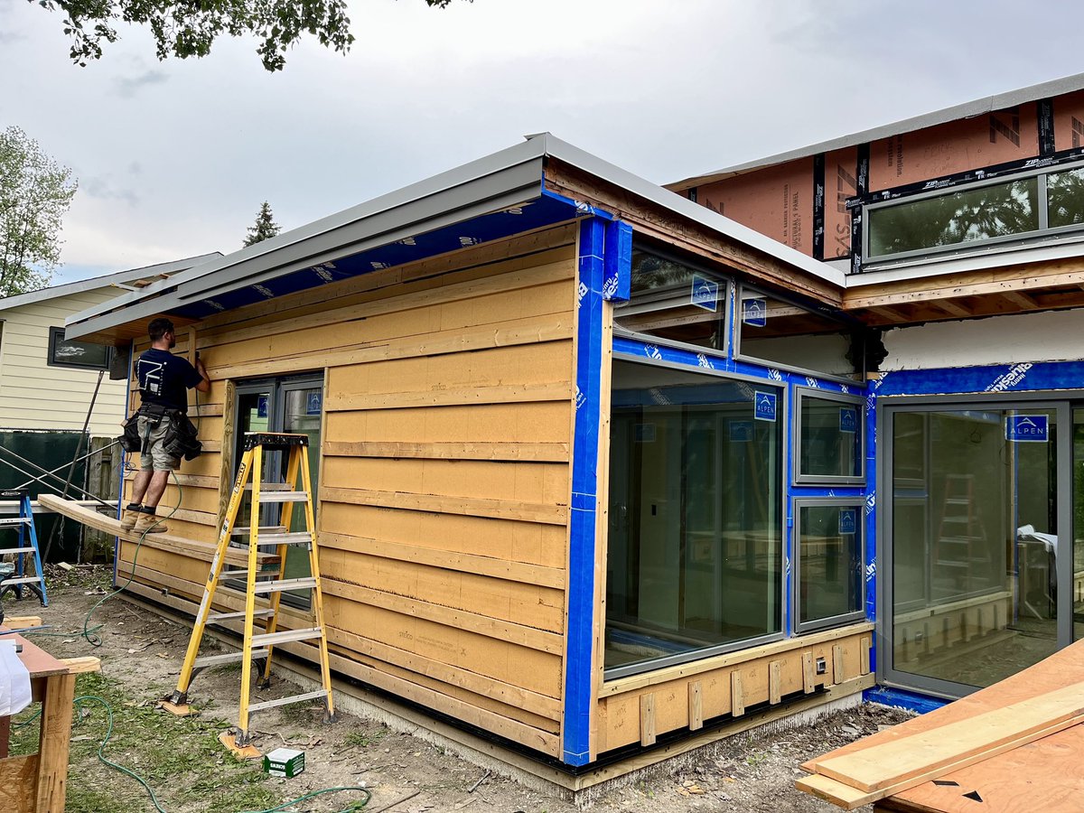 TBDArchitects's tweet photo. Update from our Midcentury for the Next Century project: new air barrier (@TheHenryCompany), wood fiberboard insulation (Steico), and @AlpenHPP triple-glazed windows..This will be a new, sleeker, smarter, sophisticated (and dry) animal with the same skeleton! https://t.co/L6GeTm8khf