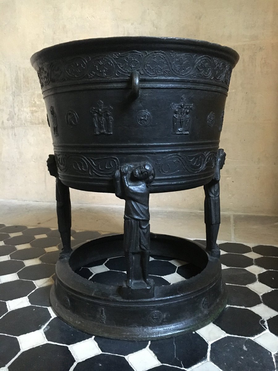 A cast bronze font from Embsen, northern Germany, on display <a href="/museecluny/">Musée de Cluny</a>. This 14th century font was made using a similar method to the casting of bells, with the appliqué decoration stamped into the mould #FontsOnFriday