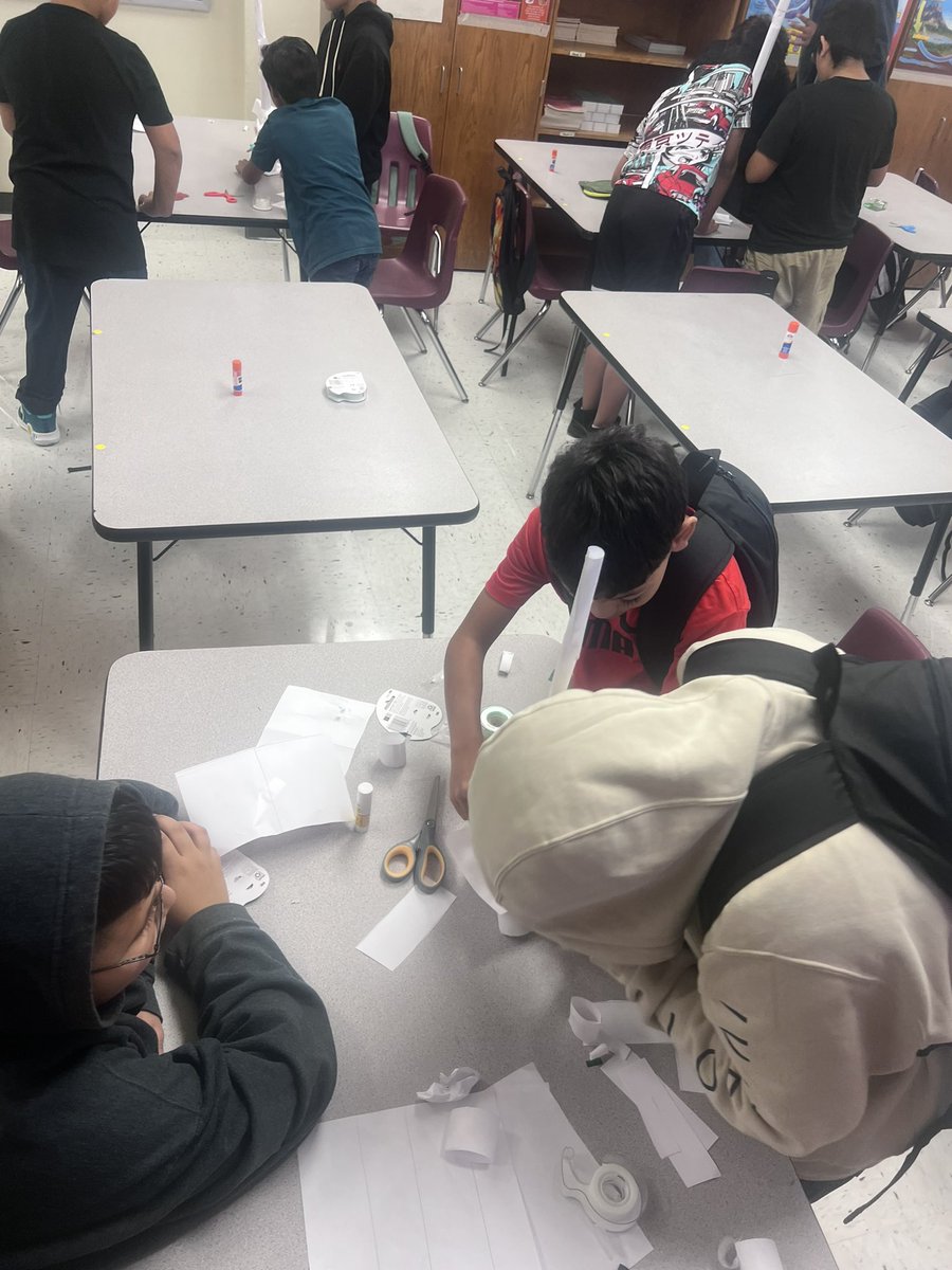 BlancaRojasMEd's tweet photo. Sixth grade @Rhodes_SAISD Science Skyscraper Challenge! Wildcats problem solve, design and use observational testing to build the highest skyscraper with 6 pieces of paper, scissors, and tape. @SAISD @SAISD_Science https://t.co/VmOj4KDkcB