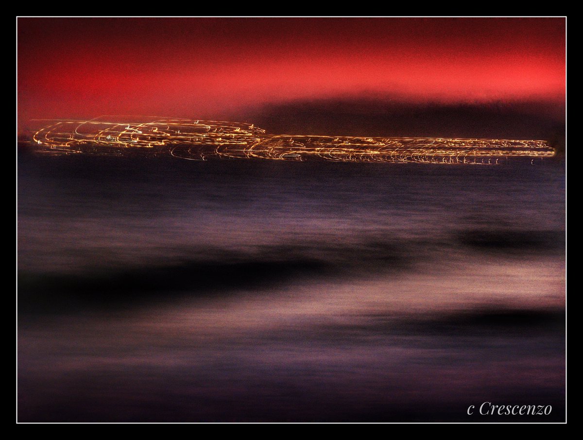 A study of motion: Sometimes it’s evocative and alluring to slow the shutter of a camera, to capture the emotion of movement and it’s energy… This is Santa Barbara’s Pier at Magic Hour… Tide coming up, and life bustling on the Pier…