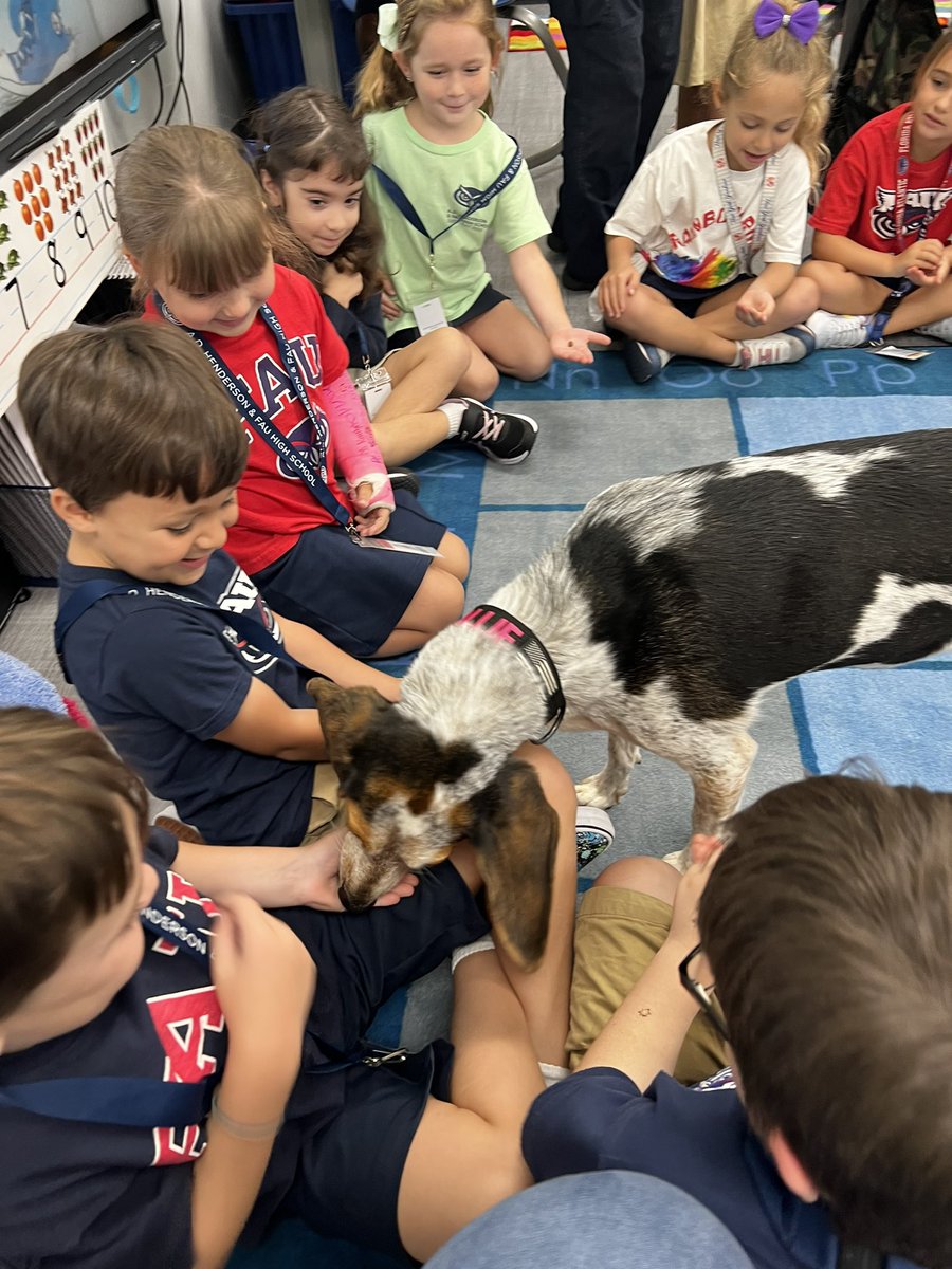 We loved having <a href="/FAUPD/">FAU Police</a>’s very own Officer Vallie stop by today. She and Officer Buchanan even brought a book with <a href="/ADHUS_FAUHS/">ADHUS & FAU HS</a> in it. Thank you for filling our Friday with so much 🐶 love! @ADHUSelementary is the BEST!