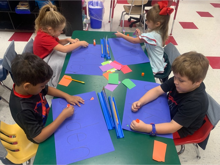 JacksonDistrict's tweet photo. Mrs. Amanda's Kindergarten has been working on names. Today the students worked on their name and used fine motor skills to tear paper to decorate the letters of their names. https://t.co/hfBTknYVXK