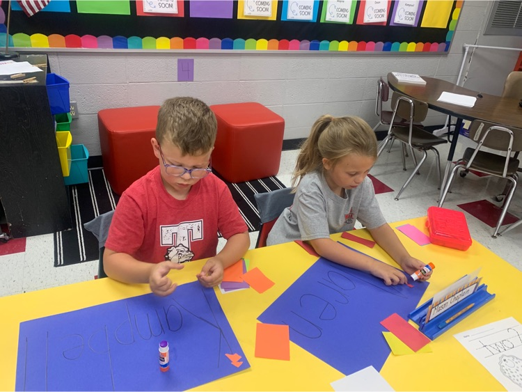 JacksonDistrict's tweet photo. Mrs. Amanda's Kindergarten has been working on names. Today the students worked on their name and used fine motor skills to tear paper to decorate the letters of their names. https://t.co/hfBTknYVXK