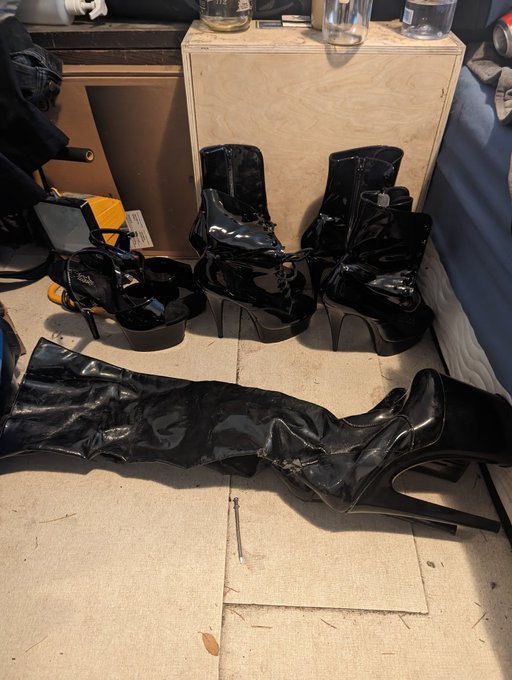My collection of heels so far, the open toed shoes and one pair of the short boots are for pole dancing