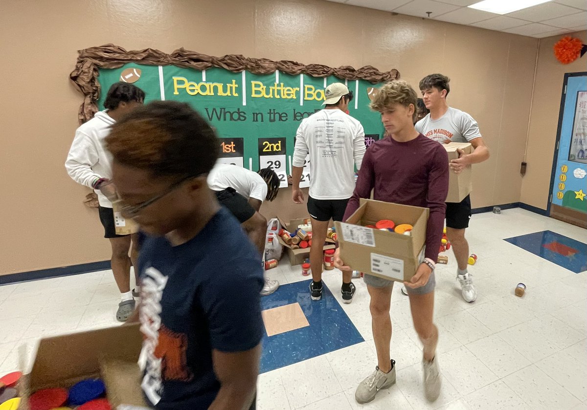 Amandajbg5's tweet photo. Northern Hills had another successful year collecting Peanut Butter for the Peanut Butter Bowl!  Thank you Madison football for collecting and delivering to the Northern Hills Ministry food pantry. @PeanutButterBwl @WulfsbergM @NeisdAthletics @NEISD @NorthernHillsES @jm_mavs https://t.co/KwlmG5sq3f