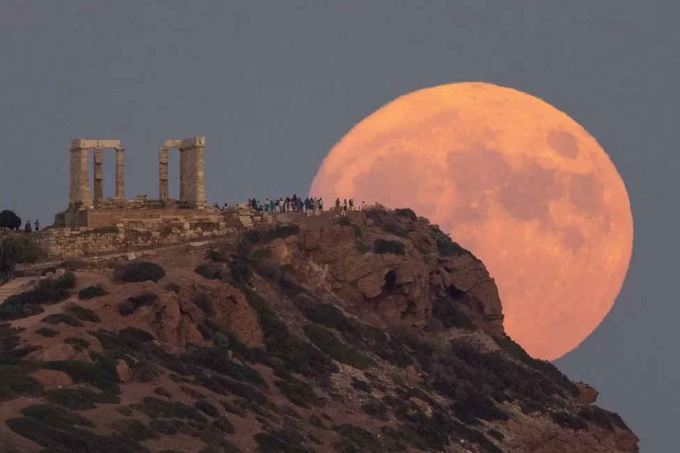 Supermoon photographed at Temple of Poseidon, Cape Sounio near Athens, courtesy of BBC.