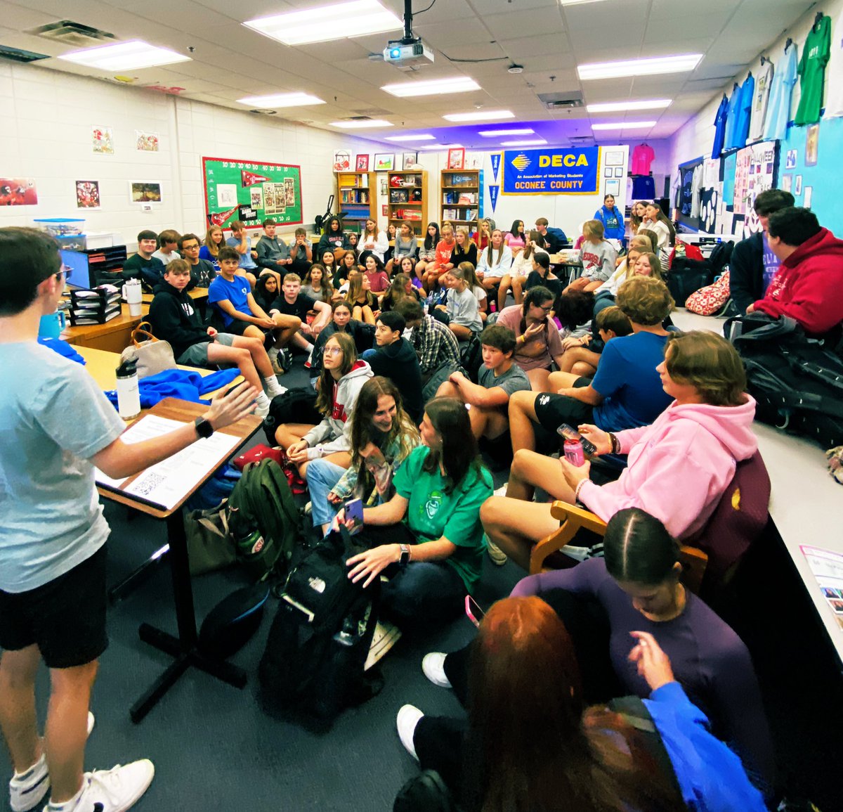 OconeeDeca's tweet photo. AMAZING turnout at today's
OCHS DECA interest meeting!! With well over 100 students in attendance, over 90 members currently registered, our chapter has a bright year ahead of us!  It’s never to late to join, come Experience The Difference with OC DECA! #WeAreOne #Spearem https://t.co/KMqLrnzrOA