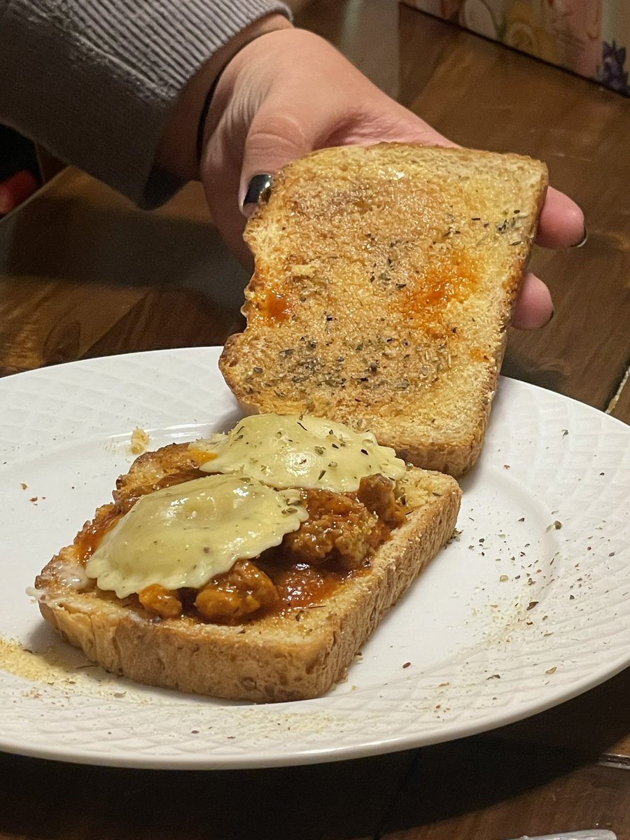 JT9779's tweet photo. Living up to #TwinA vibe… firstborn decided to make “Italy on a sandwich”… garlic bread, spaghetti sauce, ravioli. https://t.co/5IicxFFaw0