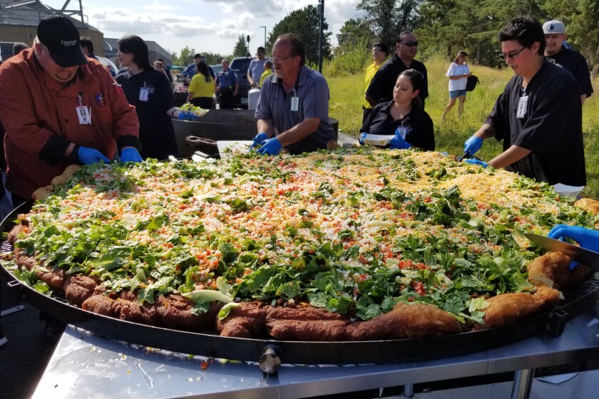 If I ran an Indian Taco stand I'd have on the menu one of those ridiculous food challenges, like "eat an 80 ounce steak and it's free" but instead "eat this massive Indian Taco and it's free" lol

Put their picture on a wall of famous Natives lol, if they don't finish it's 500$