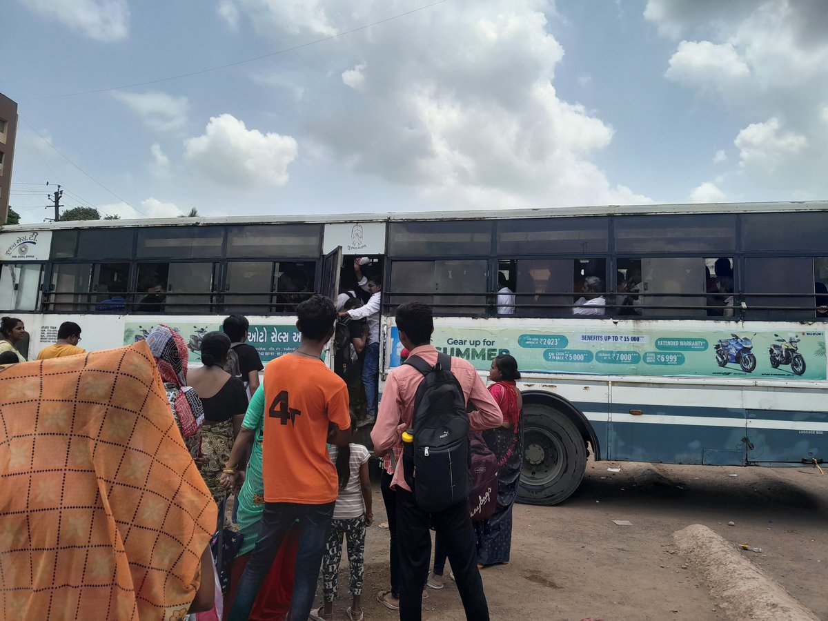 SureshParekh412's tweet photo. Extremely poor management at Navsari Bus Depot. Women and children are being dragged off and pushed to get in the crowded bus. No response from the conductor and the authorities though. Overloaded and fully packed bus.  Please look into it @OfficialGsrtc @CMOGuj @GujaratTourism https://t.co/ByCy3rPGHz