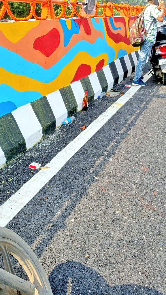 NANDANPRATIM's tweet photo. The longest flyover in Assam, the Nilachal flyover in Guwahati, was polluted with bottles of beer, water , packets of chips and pan masala etc. just within two hours of its opening yesterday. https://t.co/R9SY5zeALW