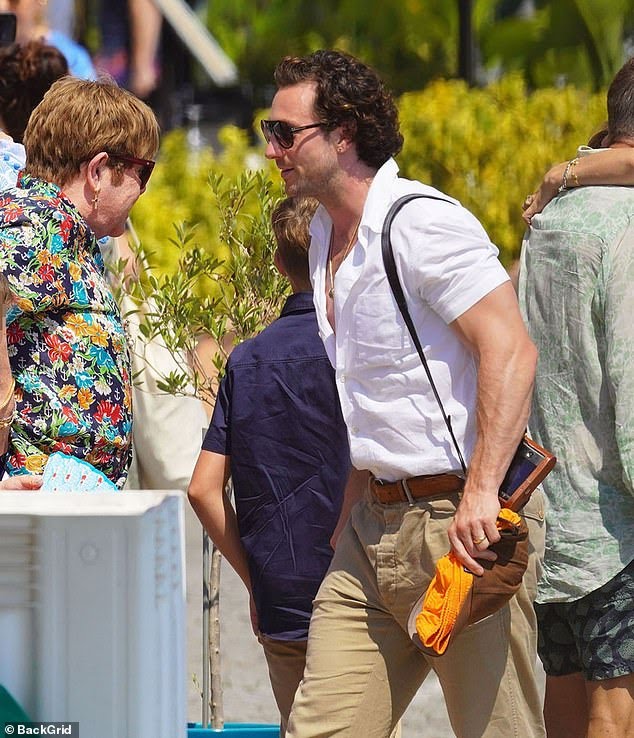 atjluv's tweet photo. New•| Aaron Taylor-Johnson with Elton John on the birthday yacht of the artist https://t.co/XhJlRcP2Tl