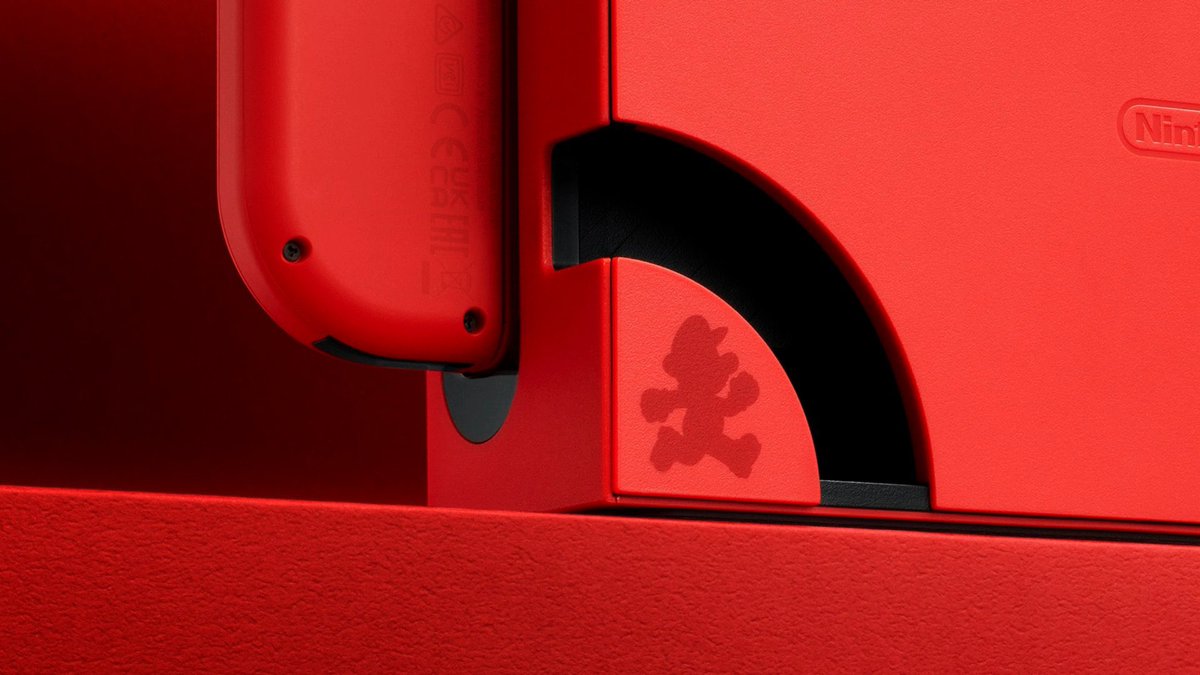 no_rhythmx's tweet photo. Nintendo really just slapped some red and some coins on it and said that will be $350 please 🤣 Maybe add some stitchings with like Mushrooms, Yoshi, 1UP etc. Put a gold coin in front of the dock where you can actually see it? Oh Nintendo 😪#nintendo #mario #switch #oled #swoled https://t.co/Bm3uaPlSp9