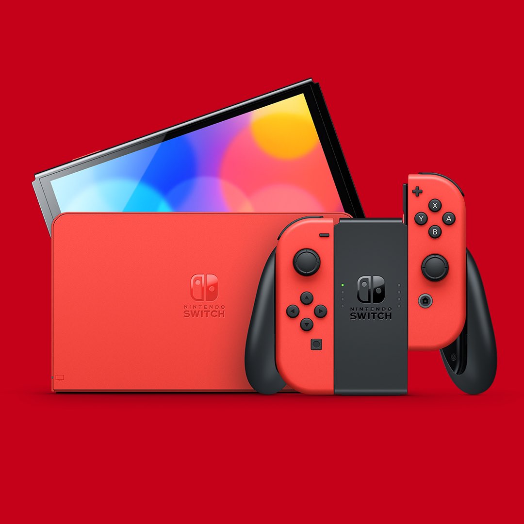 no_rhythmx's tweet photo. Nintendo really just slapped some red and some coins on it and said that will be $350 please 🤣 Maybe add some stitchings with like Mushrooms, Yoshi, 1UP etc. Put a gold coin in front of the dock where you can actually see it? Oh Nintendo 😪#nintendo #mario #switch #oled #swoled https://t.co/Bm3uaPlSp9