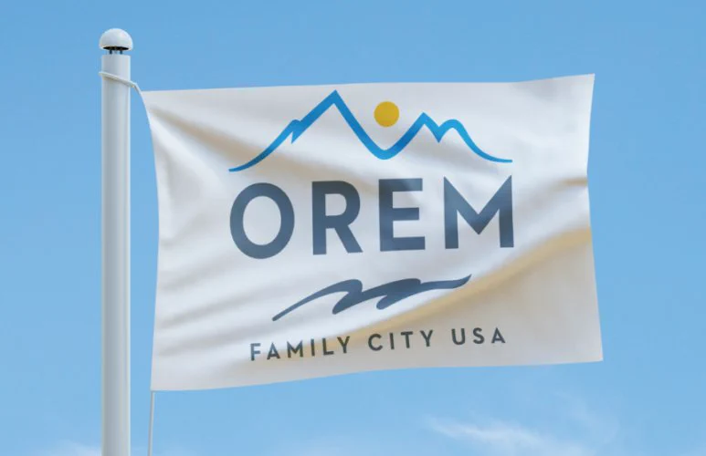Orem's new flag, which contains the text "FAMILY CITY USA"