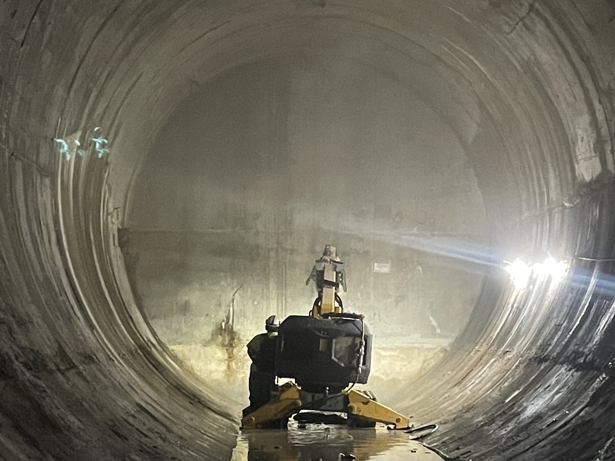 dcwater's tweet photo. The Northeast Boundary Tunnel (NEBT) is nearly finished! These photos show the demolition of a bulkhead between the First Street Tunnel and the NEBT, a key activity to getting the tunnel up and running next month! the NEBT will help reduce flooding in low-lying areas it serves. https://t.co/OIu7s2Z5Qj