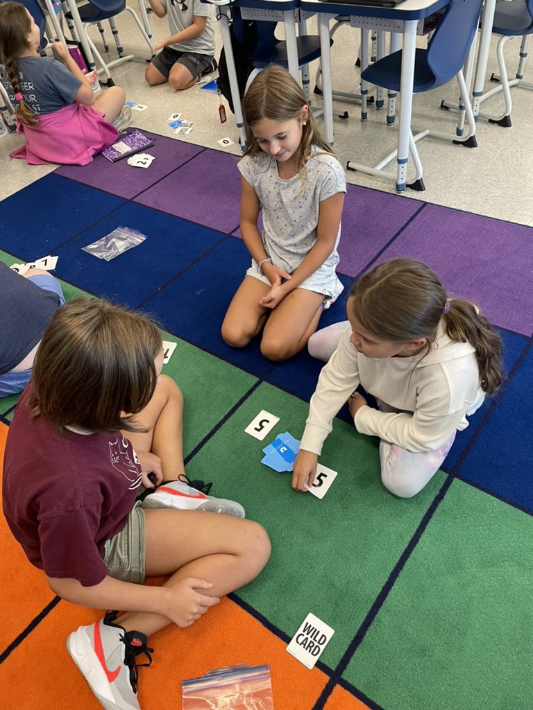 barrcaveclass's tweet photo. Warming up those multiplication fact fluency muscles with a few rounds of Multiplication War!!! #mathfactfluency #multiplication #johnsonpride https://t.co/c69Q5UGHeJ