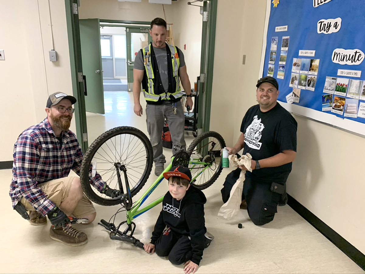 LangleySchools's tweet photo. Photos help tell our stories. Here are some of our top photo posts from the 2022-2023 school year. At number 1, we celebrate some of our District electricians who helped fix a student’s bike on their lunch break. https://t.co/iSiBMxs1rM