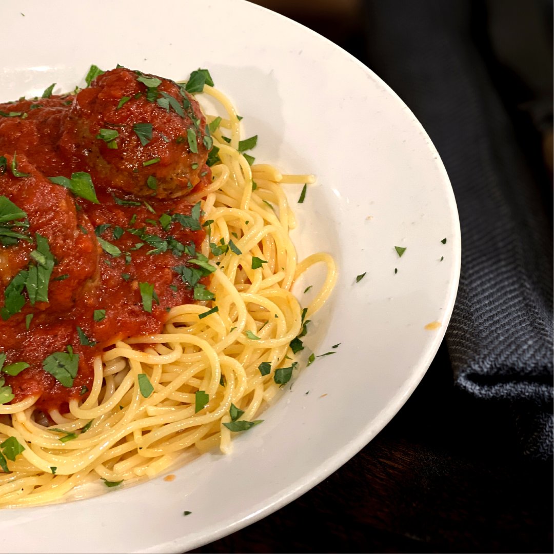 Three in-house-made meatballs slow simmered in our plum tomato sauce over fresh spaghetti. 

Stop by 180 James Street South for a taste of Italy. 

#LaPiazza #hamiltoneats #eathamont #hamiltonishome #italian #italianhamilton #menu #foodhamilton #hamont #dinein #pasta #meatballs