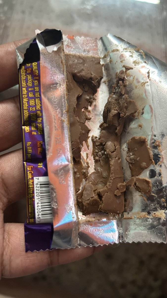 Mrinal_K_Roy's tweet photo. Got this chocolate from one of the celebrations pack and the expiry date is Dec 2023 but see the inside of the bar. White fungus is shown in the chocolate. @DairyMilkIn - What the hell are you guys providing us. @fssaiindia - Please see to it so that no mishap happens to anyone. https://t.co/qhwnCLQXAb