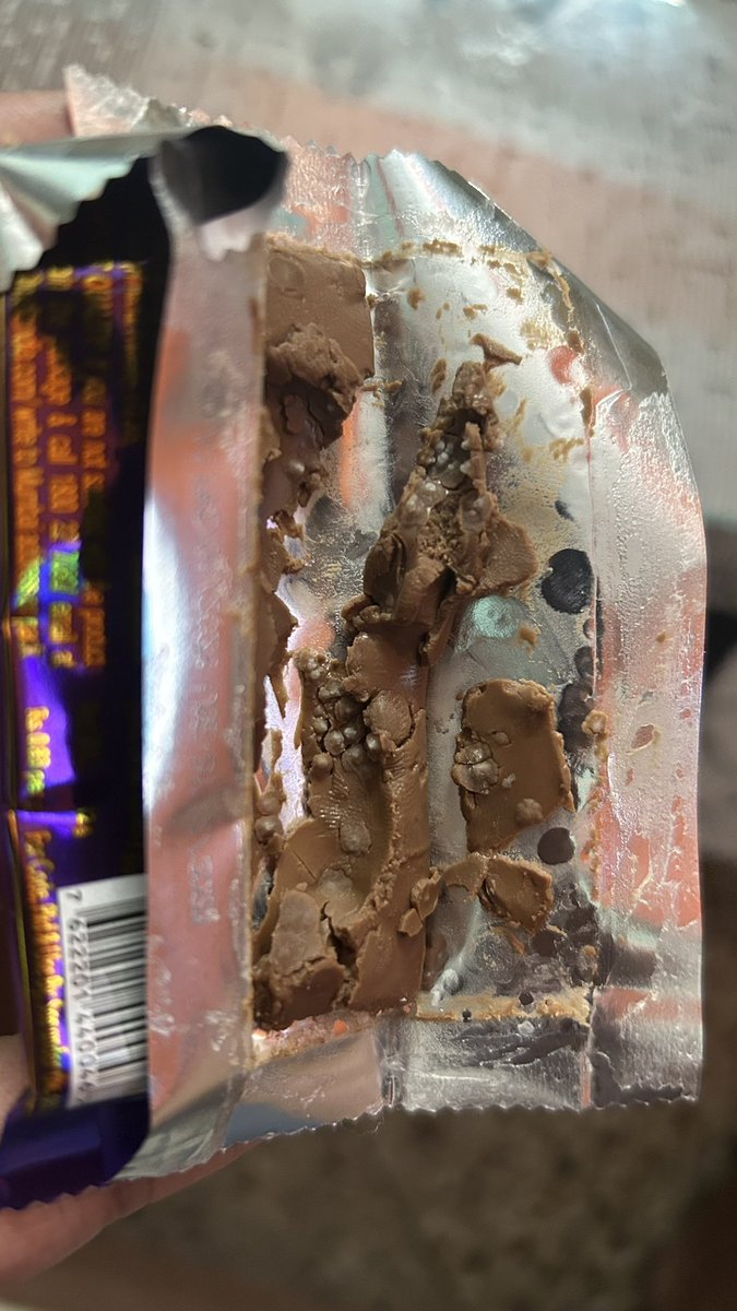 Mrinal_K_Roy's tweet photo. Got this chocolate from one of the celebrations pack and the expiry date is Dec 2023 but see the inside of the bar. White fungus is shown in the chocolate. @DairyMilkIn - What the hell are you guys providing us. @fssaiindia - Please see to it so that no mishap happens to anyone. https://t.co/qhwnCLQXAb