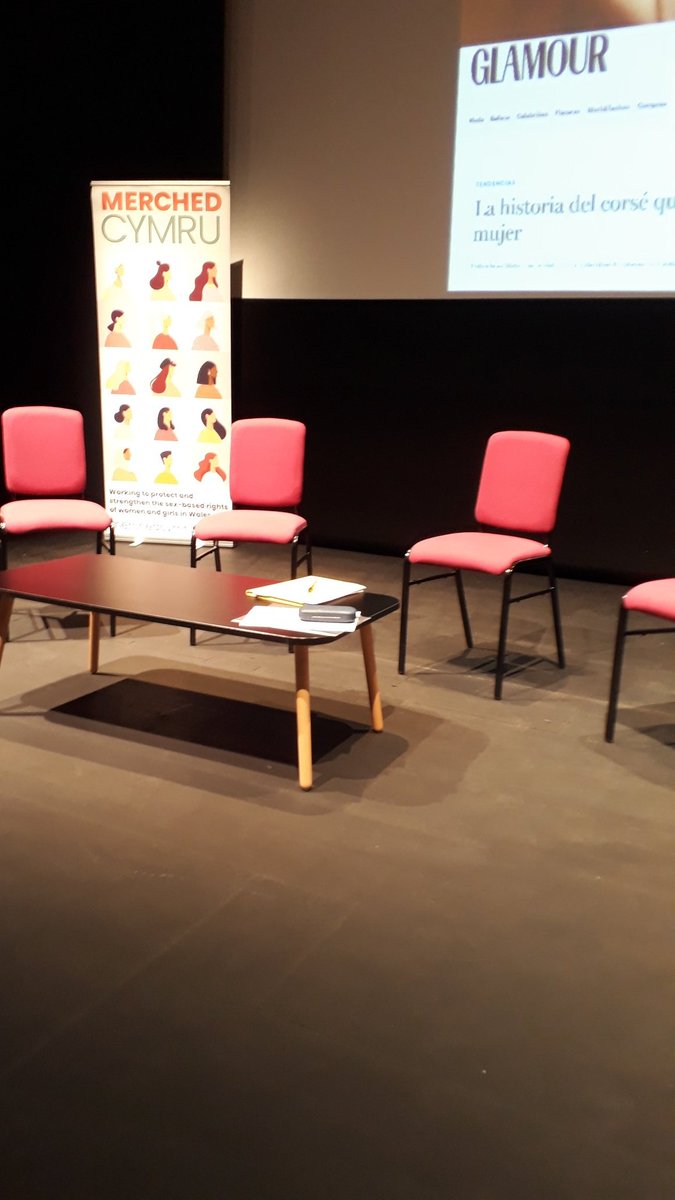 All set up for our panel and chair as  everyone takes their seat.

There's a strict no photos and no phones policy at the venue during the event, so we may be a little quiet during proceedings. See you later!

#WarAgainstWomen #NiFyddMenywodYnDdistaw