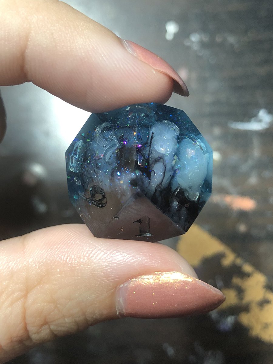 HealersHug's tweet image. Was going for an Astral Sea type vibe with this set. I personally think there’s too much glitter and the blue is not the shade I was going for but it is quite pretty. 
#handmadedice #dice #dnd #dungeonsanddragons #ttrpg