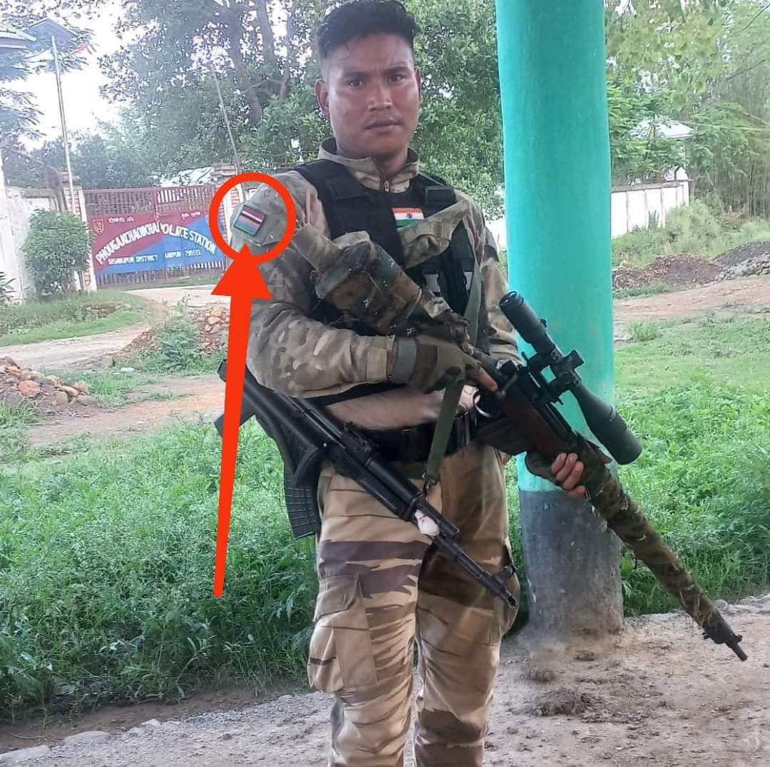 #MeiteiLiesXposed 
A #MeiteiPolice rifleman can be seen posing in front of Phougakchau Ikhai Police Station near Kangvai, wearing a #separatist flag. Is he a Real Police OR a #MeiteiTerrorists OR an #Arambai_Tenggol militant? 
IT DOESN'T MAKE ANY DIFFERENCE! THEY'REALL THE SAME.