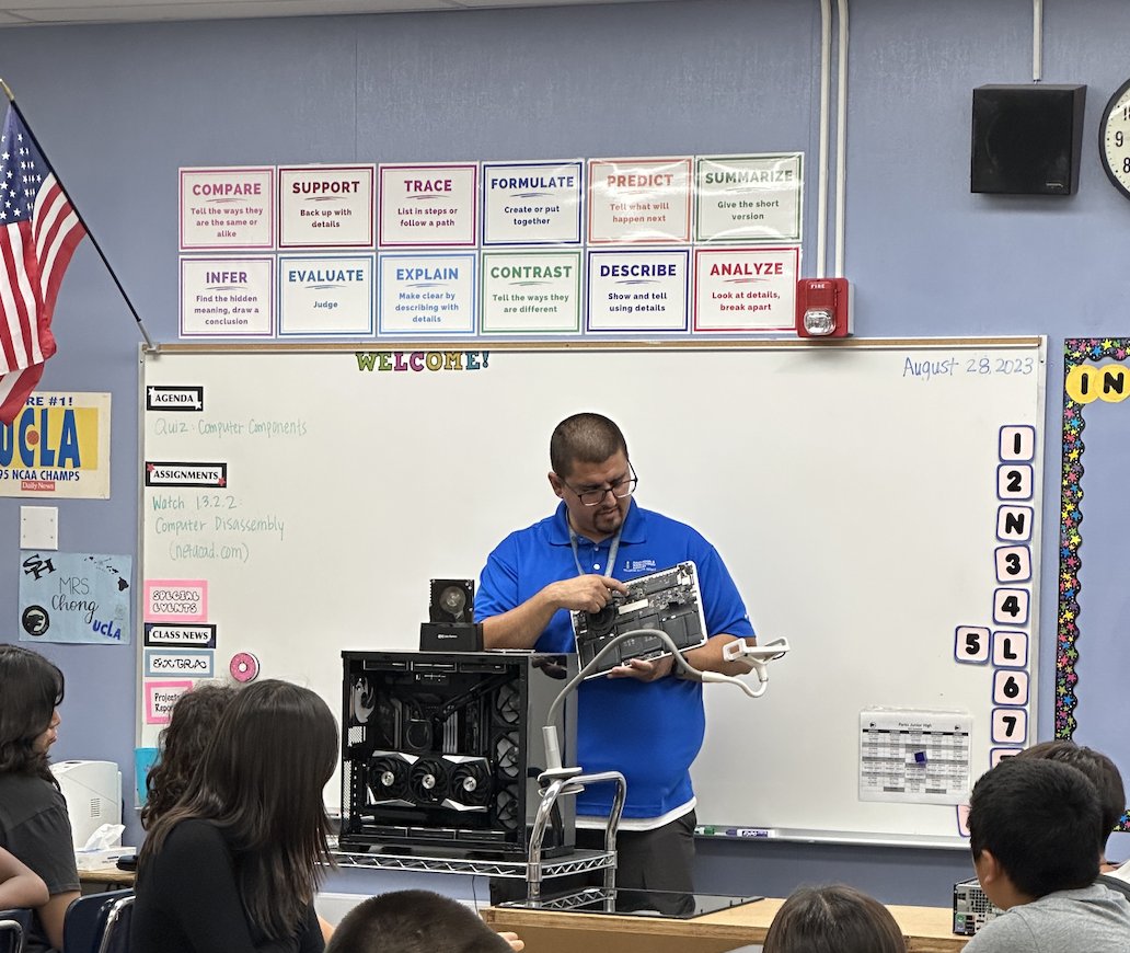 ParksJHS's tweet photo. When Mr. Pedro shares his passion for computers with our new Pathfinder: Networking class we have the best IIS support staff!- Learning new things! @FullertonSD #TheParksWAY @MrsMundschau #fsdlearns https://t.co/QXWLVvJEjY