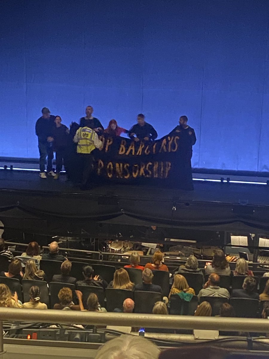 dhmcl7's tweet photo. Anti Barclays protesters at Sadler’s Wells Romeo and Juliet show now. Disruption for 20 minutes! https://t.co/8K0Q4LfxSh