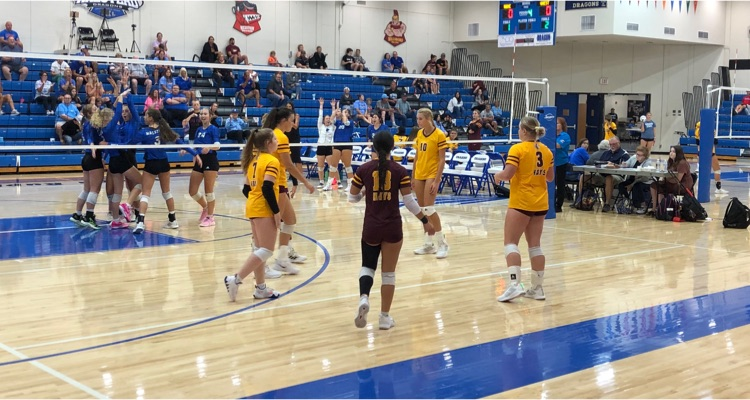 The Lady Dragons sweep Hays 25-14, 25-18, and 25-20.