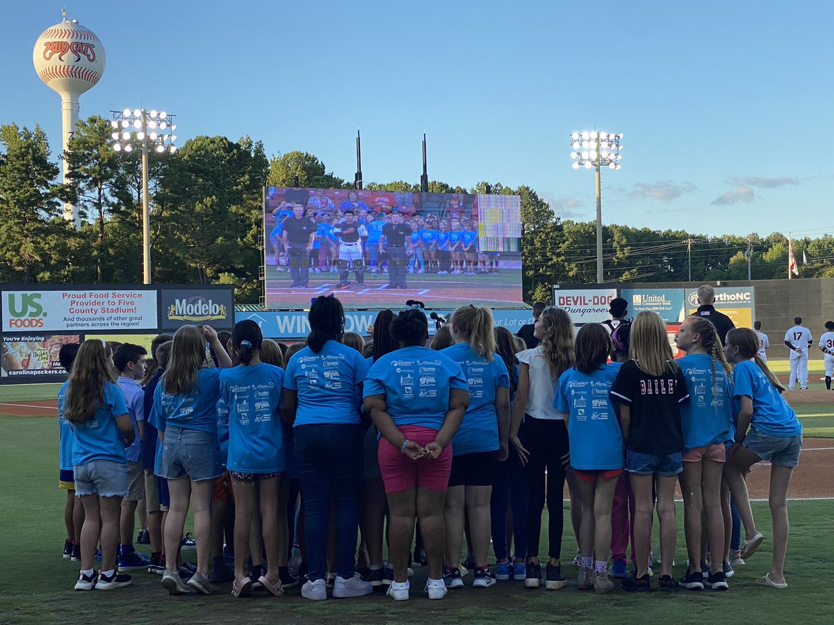 DurantRoadES's tweet photo. What a great event tonight at the Carolina Mudcats game! Our chorus did a wonderful job singing the National Anthem. Ms. Hartley threw the first pitch. Campbell tossed the coin. And…. They donated $1,590 to our school!! https://t.co/E4cTTp83nh
