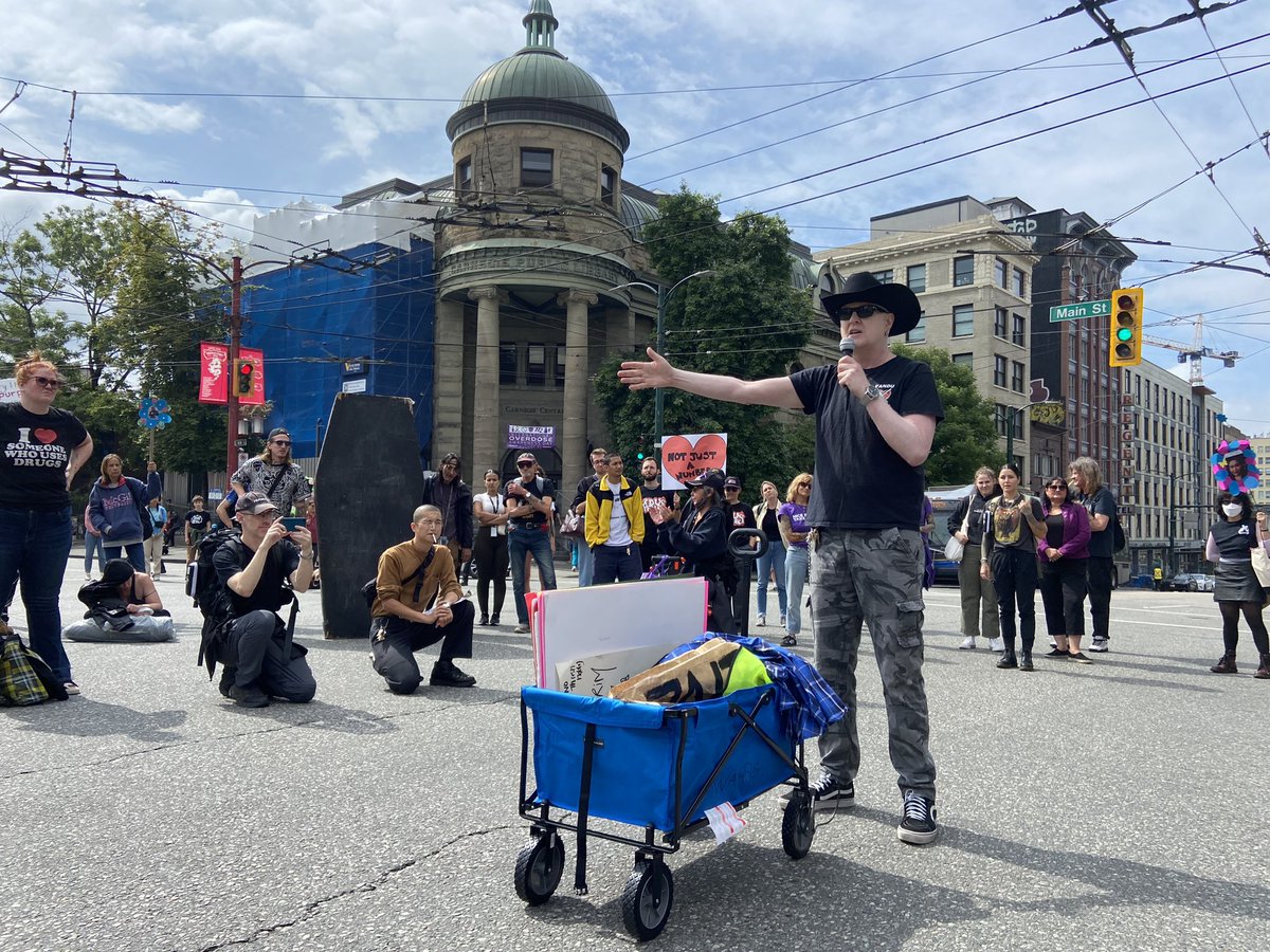 garthmullins's tweet photo. About 200 people marched to Main &amp; Hastings today to mark #IOAD. "This is where the drug war started," I said, "and this is where we're gonna end it." 📷@alexmdeboer https://t.co/tnWUMQGjep