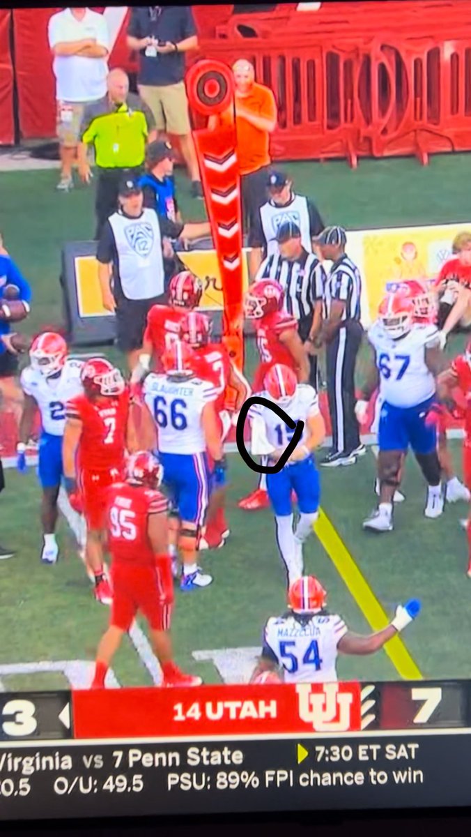 joeclarkin's tweet photo. Graham Mertz just got hit so hard a Utah towel ended up in his shoulder pad and he thought it was his own https://t.co/3Gtk5YiXyb