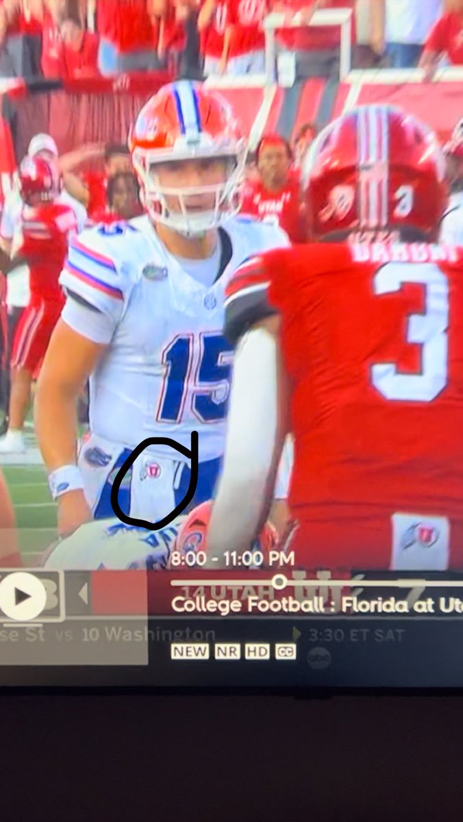 joeclarkin's tweet photo. Graham Mertz just got hit so hard a Utah towel ended up in his shoulder pad and he thought it was his own https://t.co/3Gtk5YiXyb