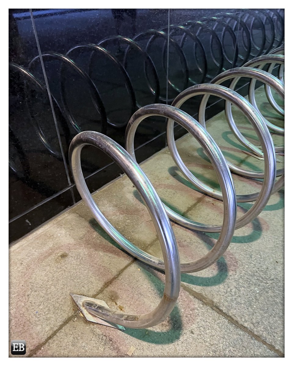 “Double Coil; Double Coil” is.gd/MWncVb #TheDailyMobile #photography #BikeRack #Coiled #Coiledup #Coiling #Coils #DoubleCoil #DowntownToronto #FinancialDistrict #Metal #Reflections #Toronto