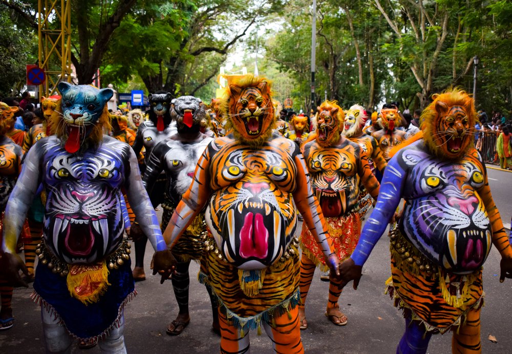 KeralaTourism's tweet photo. When tigers roam free on the streets, you can be sure it's Onam!

Pulikali (Tiger Dance), which recreates a hunt, is a vibrant art form that’s more than 200 years old. The highlight is the body-paint in yellow, black and white stripes to resemble tigers. One of the most popular enactments of the Pulikali which takes place at the Swaraj Round in Thrissur, will be held today.

#Pulikali #Thrissur #OnamArtform #LandOfHarmony #Onam2023 #OnamBeyondBorders #OnamFestKerala #FestivalofEquality #KeralaTourism