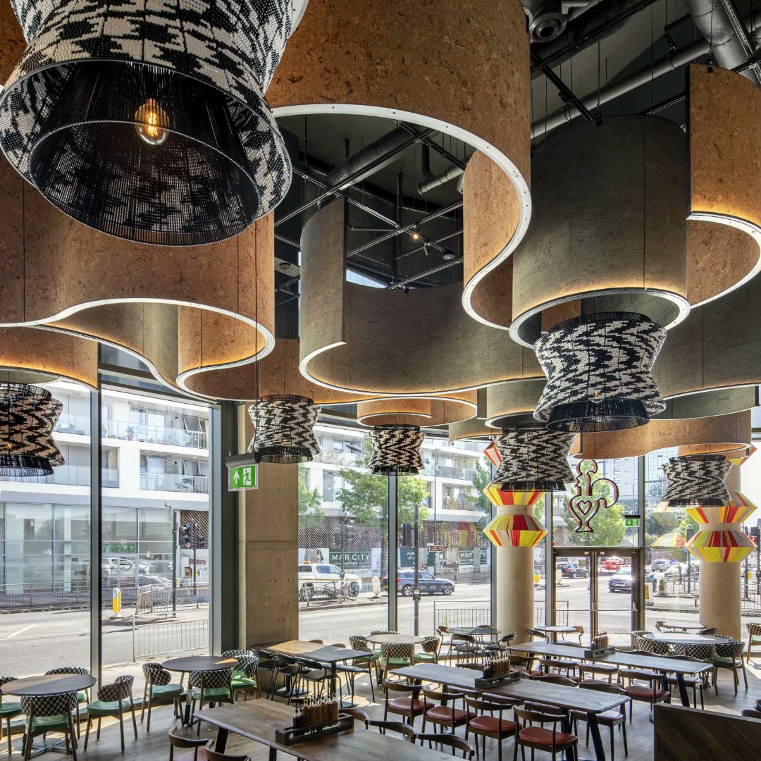 A custom Liz Pendant made for Nando's Belfast in the UK. Always a marvel and its always special that our lights are surrounded by beautiful artworks at each Nando's Casa. This project was designed by Harrison.

#custommade #handwoven #lighting #restaurantdesign