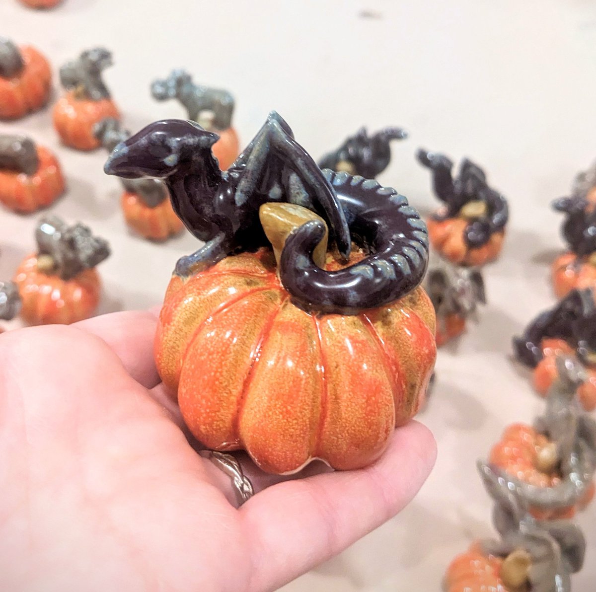 Last week it was almost 100 out, today we put on sweatshirts to walk to the bus. Fall comes at you like an avalanche, are you ready? #dragons #pumpkins #pottery #ArtistOnTwitter #artistsonx #ceramics #fall #autumn