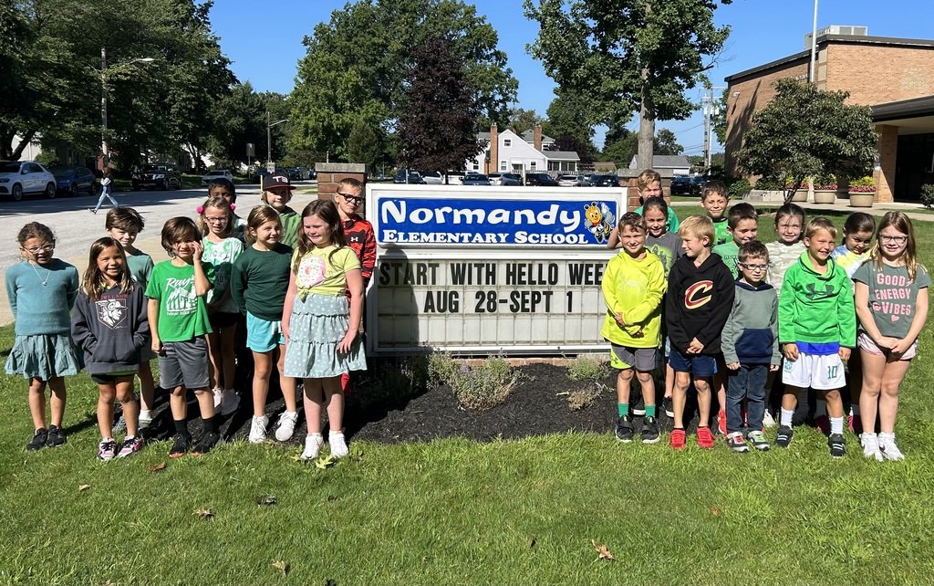 Mrs. Hart's second-grade class wore Green for Start with Hello Week! #SWHW #BeProudToBeBay