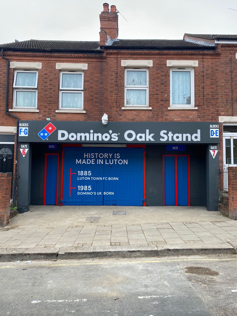 Last season Luton Town won the Championship play-off final. 

This is the main entrance to their stadium.    

Incredible to think this ground is in the Premier League this season. 🤯