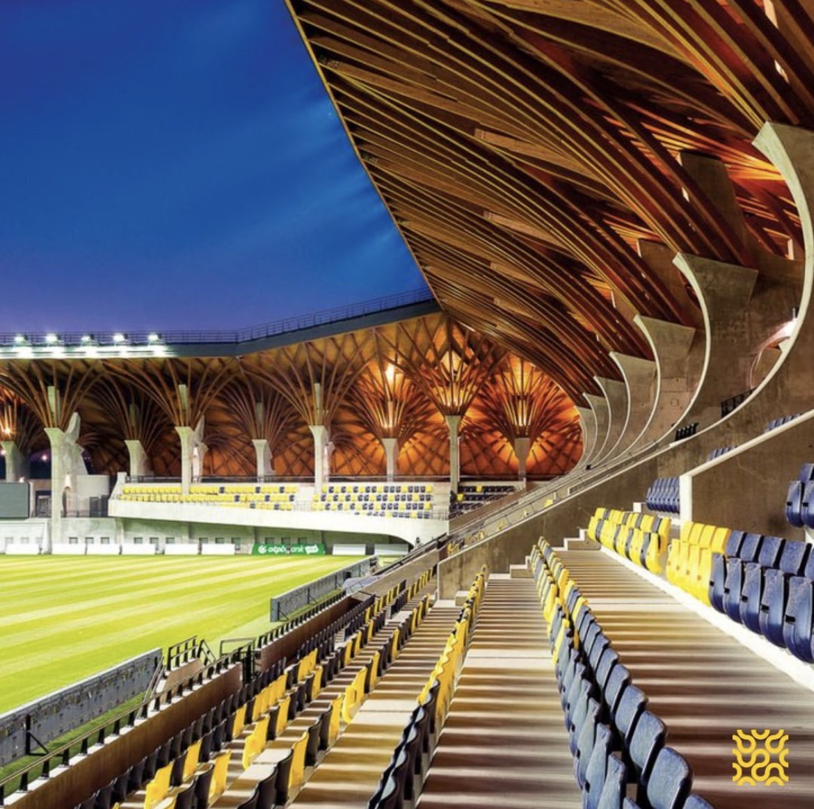 Glulam roof of the Felcsut football stadium, Hungary, made of 3,500 arched beams

Designed by Imre Makovesz