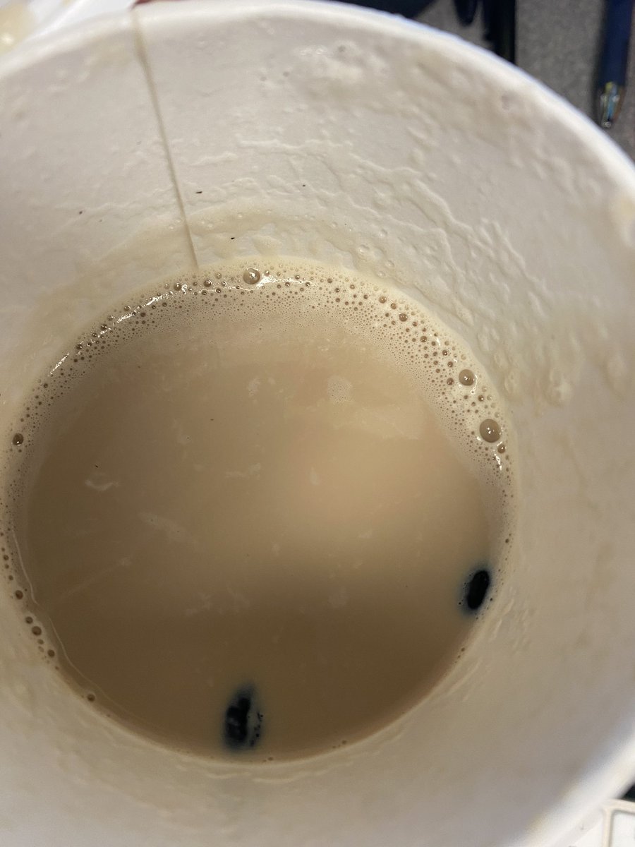 Misteedwalker's tweet photo. Definitely not worth the $6.25 I just sent down the drain @StarbucksCanada 
Half full coffee full of coffee beans and grounds 
#notwhatimeantwithextrashot https://t.co/UorqexwFHA