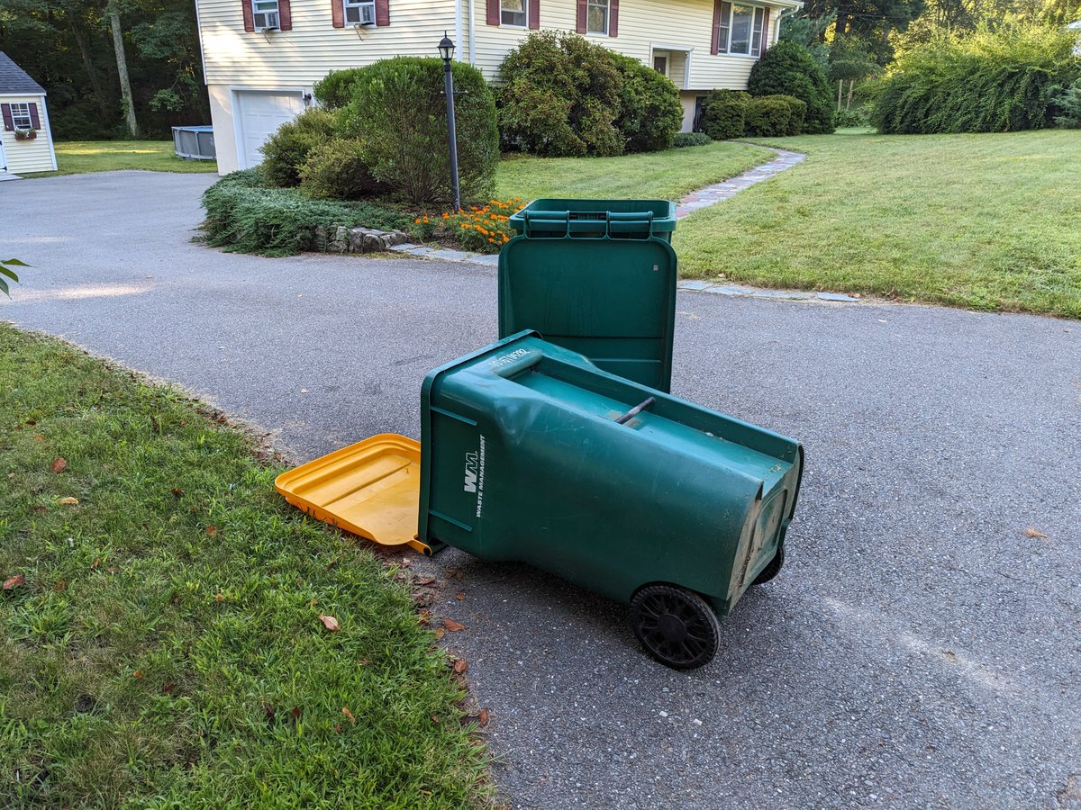 russwilliston's tweet photo. @WasteManagement Not your best work this morning WM!  My wife watched the truck set these down and continue on.  Lancaster, Mass. https://t.co/nqyqnLJUg5