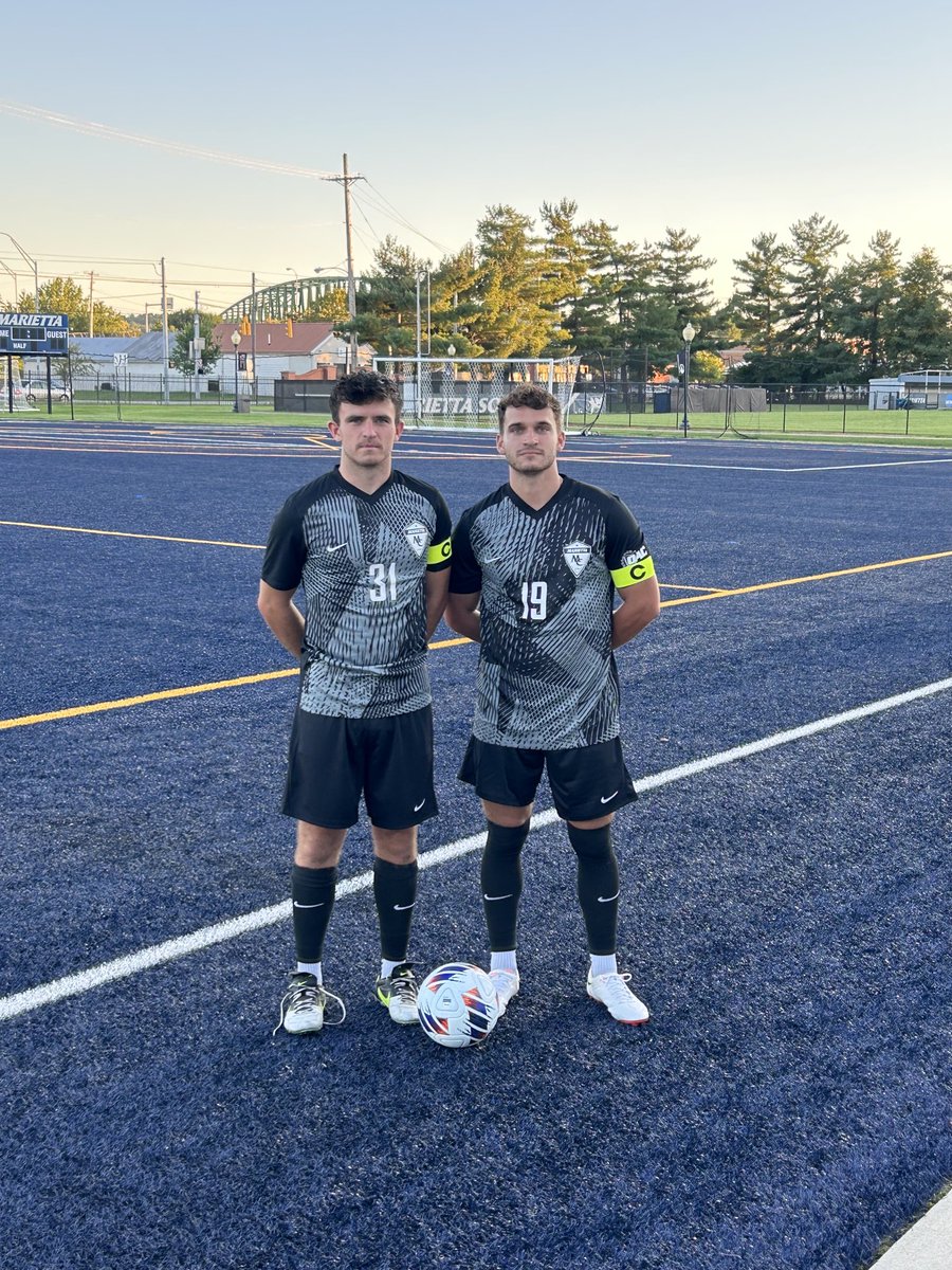 MC_MensSoccer's tweet photo. Captains Ben Teasdale and Gavin Chappel with the new “Black Out” kits that the team will be wearing in our season opener tonight on the Blue Turf. First kick against Chatham is set for 6:45 pm. Women’s home opener precedes us at 4 pm. #WTBH #BRHD https://t.co/QaAneIZsAE